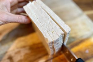 Cut tofu into four large squares